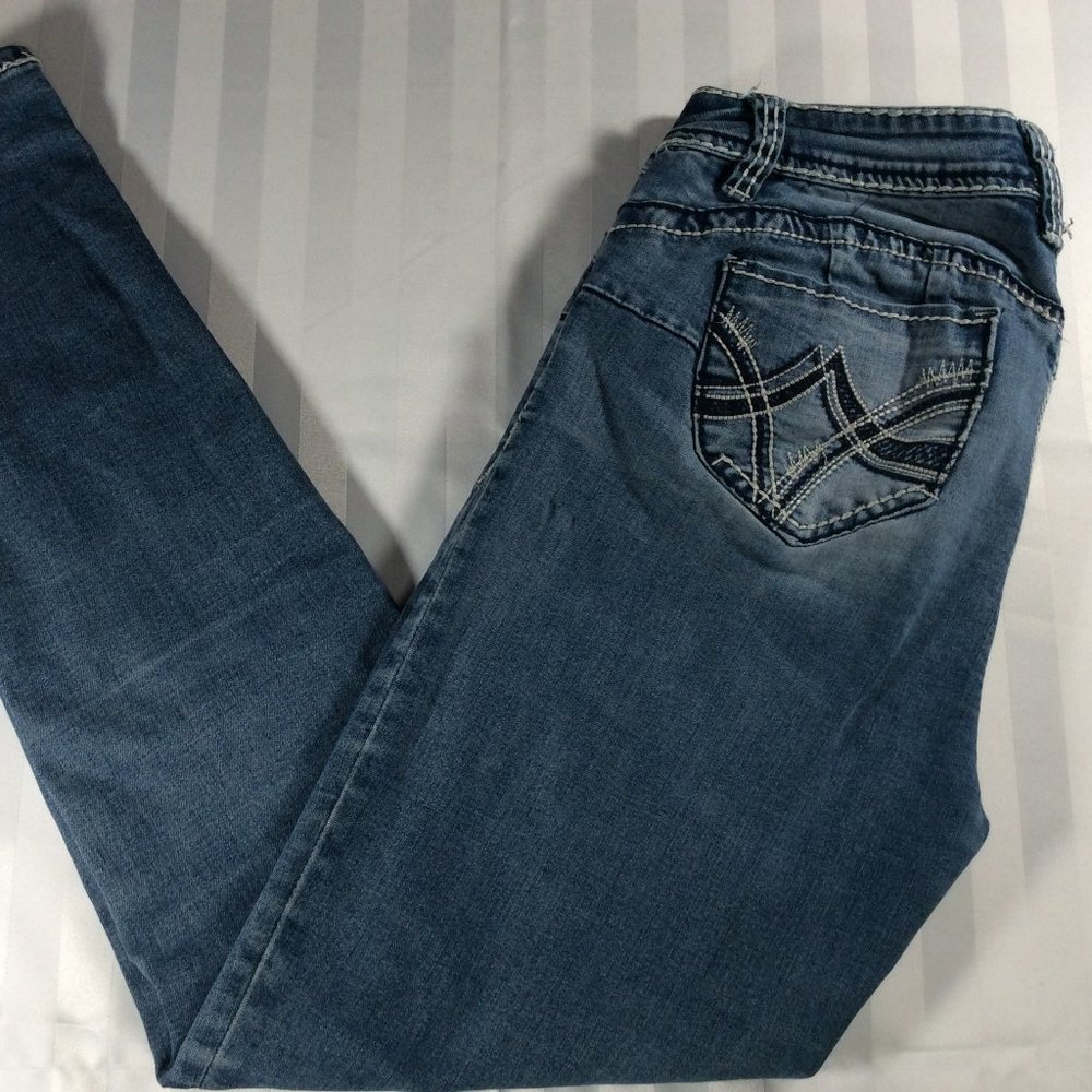 Medium Wash Very Distressed Skinny Jeans